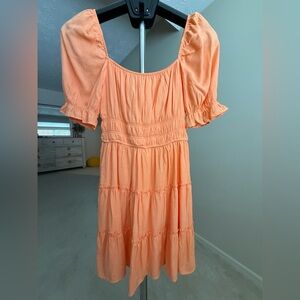 Francesca’s Orange Peplum Midi Dress with Puff Sleeves